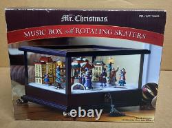 Mr. Christmas Wood Music Box with Rotating Skaters Animated and Illuminated New